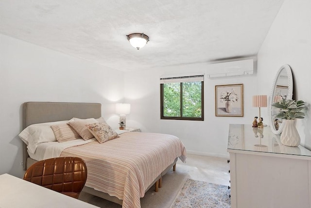 34 Staffordshire Ln Unit 34, Concord, MA 01742 - carpeted bedroom featuring a wall mounted air conditioner and baseboards