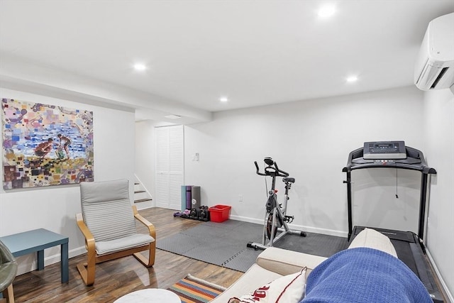 34 Staffordshire Ln Unit 34, Concord, MA 01742 - workout area featuring a wall mounted AC, wood finished floors, recessed lighting, and baseboards