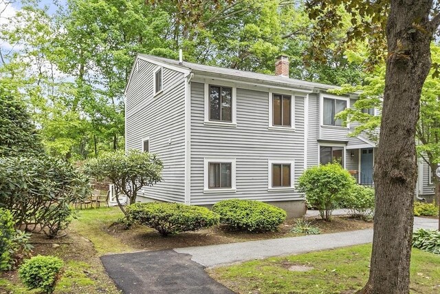 34 Staffordshire Ln Unit 34, Concord, MA 01742 - view of front of house featuring a chimney