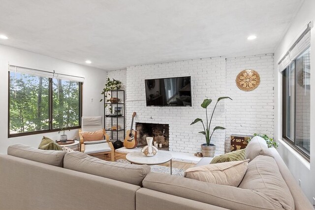 34 Staffordshire Ln Unit 34, Concord, MA 01742 - living area featuring a fireplace, wood finished floors, and recessed lighting