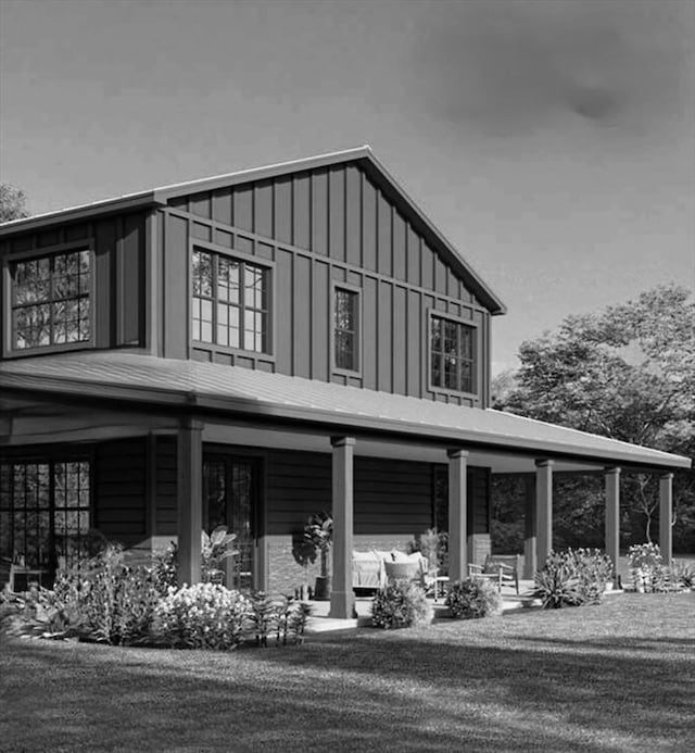 exterior space with a porch and board and batten siding