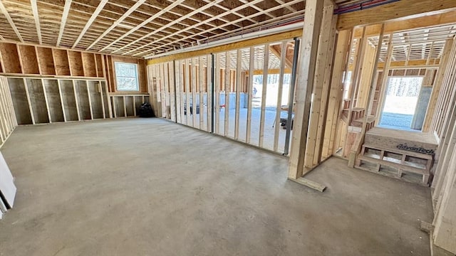 misc room with concrete flooring and plenty of natural light
