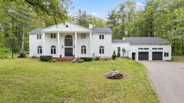78 Holden Rd, Paxton, MA 01612 - neoclassical / greek revival house featuring a garage, a chimney, driveway, and a front lawn