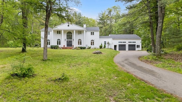 78 Holden Rd, Paxton, MA 01612 - neoclassical home featuring driveway, a garage, a front yard, and a chimney