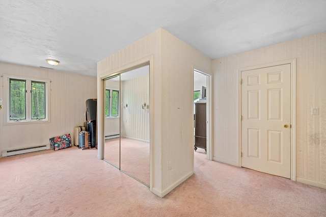 78 Holden Rd, Paxton, MA 01612 - unfurnished bedroom featuring baseboard heating, light colored carpet, and a closet