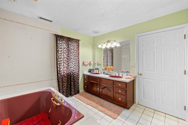78 Holden Rd, Paxton, MA 01612 - full bath with a bathtub, double vanity, and tile patterned floors