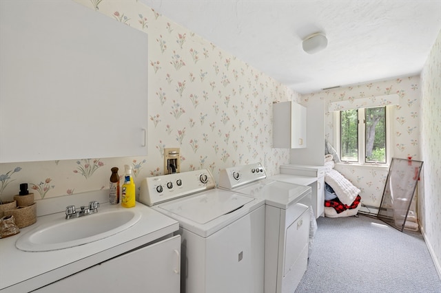 78 Holden Rd, Paxton, MA 01612 - laundry area with wallpapered walls, washing machine and clothes dryer, light colored carpet, and cabinet space