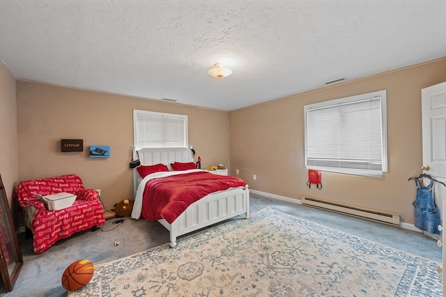 78 Holden Rd, Paxton, MA 01612 - bedroom with baseboard heating, carpet, baseboards, and a textured ceiling