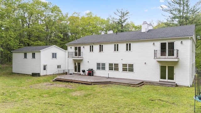 78 Holden Rd, Paxton, MA 01612 - back of house with a balcony, a chimney, french doors, and a yard