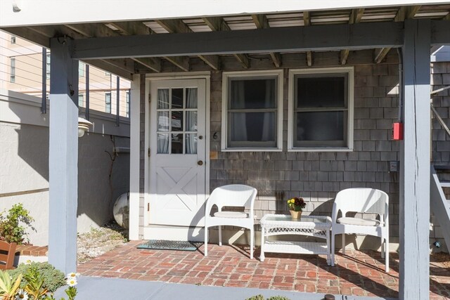 doorway to property featuring a patio area