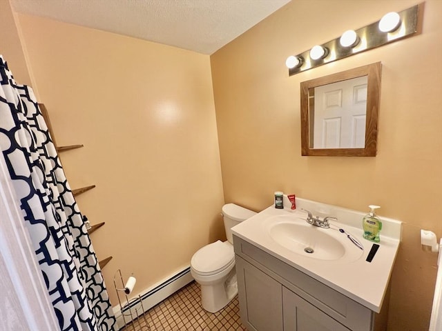 bathroom featuring a textured ceiling, vanity, toilet, and baseboard heating