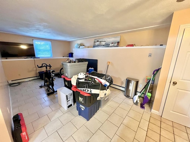 bedroom featuring light tile patterned floors and a baseboard radiator