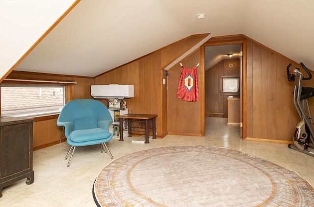 sitting room with lofted ceiling, wood walls, and a wall mounted AC