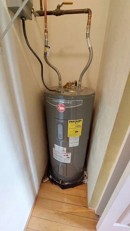 utility room with water heater