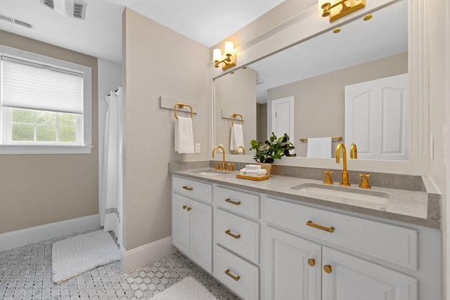 19 Cardiff Rd, Windham, NH 03087 - full bath featuring double vanity, baseboards, tile patterned floors, and curtained shower
