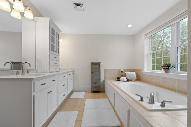 19 Cardiff Rd, Windham, NH 03087 - bathroom with vanity, a garden tub, tile patterned floors, baseboards, and recessed lighting