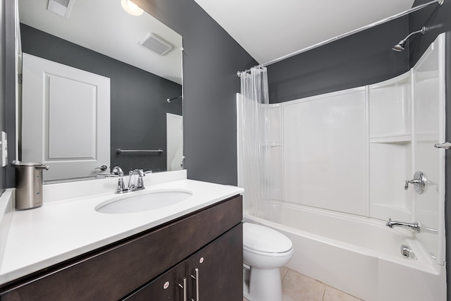 full bathroom featuring vanity, shower / tub combo with curtain, toilet, and tile patterned floors