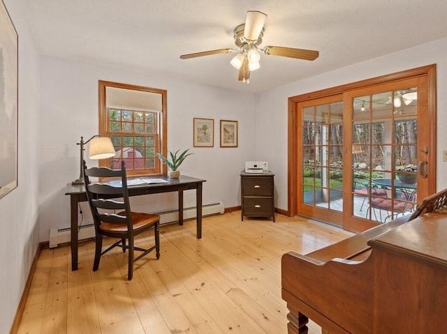 office featuring plenty of natural light, baseboards, ceiling fan, and light wood-type flooring