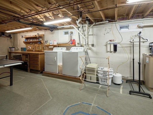 unfinished below grade area with water heater and independent washer and dryer