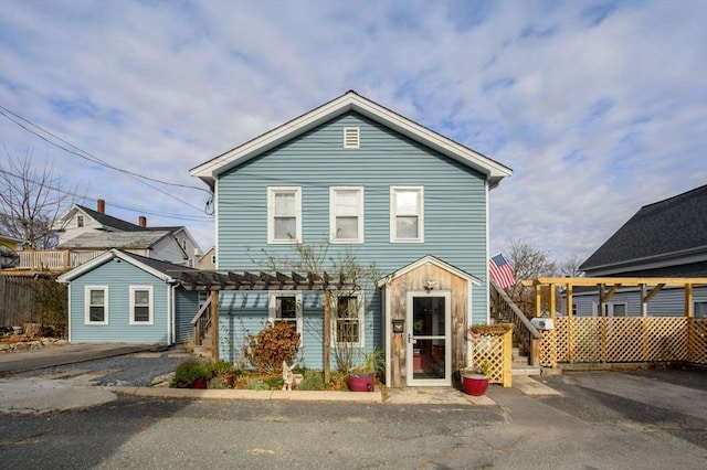 front of property featuring a pergola