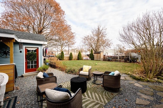 view of patio with a storage shed