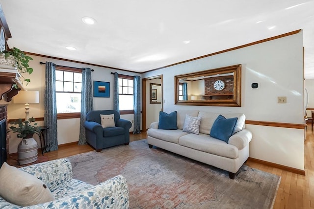 living room featuring recessed lighting, a fireplace, wood finished floors, baseboards, and ornamental molding