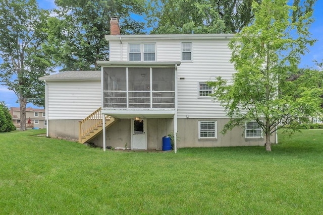 5 Upland St, Auburn, MA 01501 - back of house featuring a chimney, a sunroom, a yard, and stairway