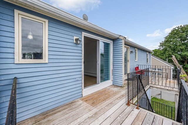 45 W 3rd St Unit 6, Lowell, MA 01850 - wooden terrace with a baseboard radiator