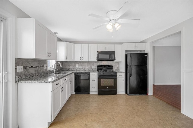 45 W 3rd St Unit 6, Lowell, MA 01850 - kitchen with black appliances, light stone countertops, white cabinets, and decorative backsplash