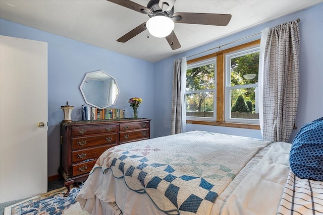 bedroom featuring ceiling fan