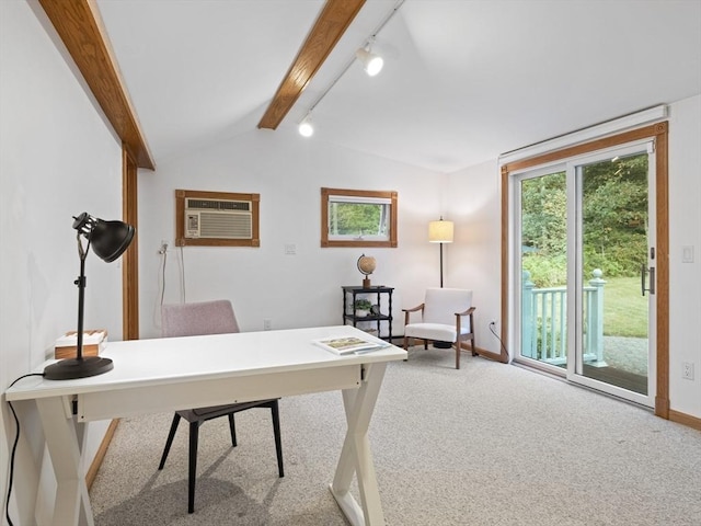 carpeted office space featuring track lighting, lofted ceiling with beams, and a wall mounted air conditioner