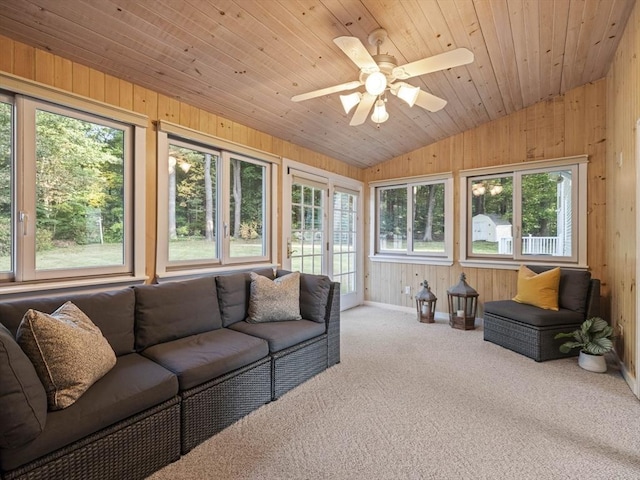 sunroom featuring vaulted ceiling, wooden ceiling, and ceiling fan