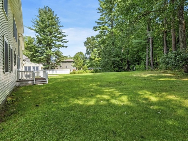 view of yard featuring a deck