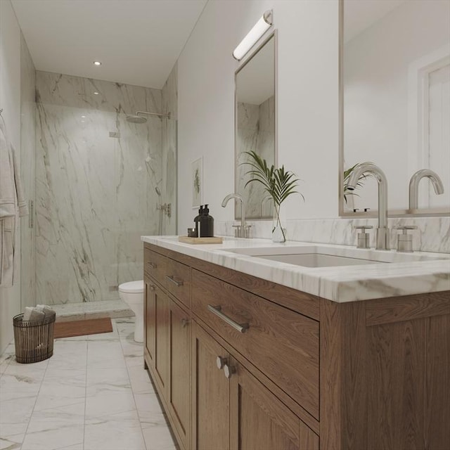 bathroom featuring vanity, walk in shower, and toilet