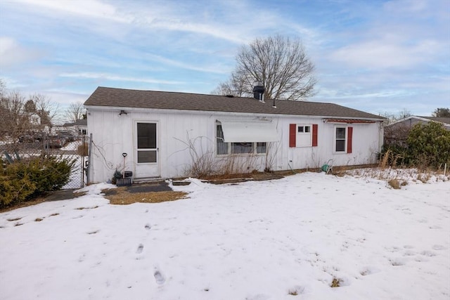 view of snow covered house