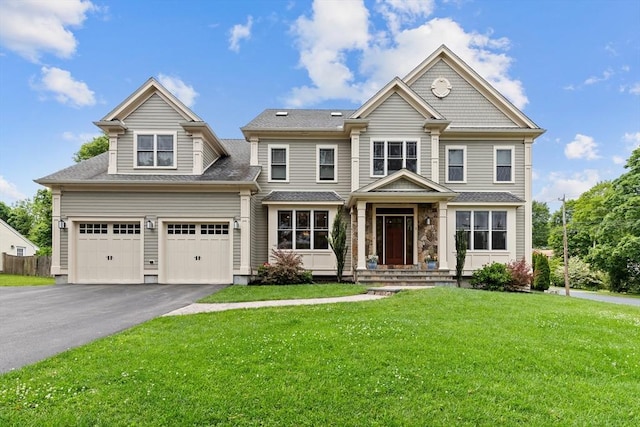 1 Apollo Cir, Lexington, MA 02421 - view of front facade featuring driveway, an attached garage, and a shingled roof