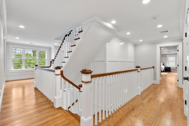 1 Apollo Cir, Lexington, MA 02421 - corridor featuring light wood-style floors, recessed lighting, an upstairs landing, and ornamental molding