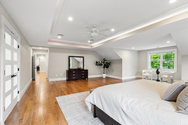 1 Apollo Cir, Lexington, MA 02421 - bedroom featuring light wood finished floors, a raised ceiling, recessed lighting, and a ceiling fan
