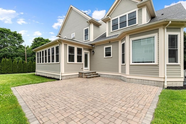 1 Apollo Cir, Lexington, MA 02421 - rear view of property featuring a patio, a yard, and roof with shingles