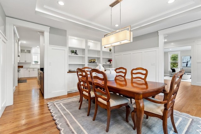 1 Apollo Cir, Lexington, MA 02421 - dining room featuring light wood-style floors, recessed lighting, and a decorative wall