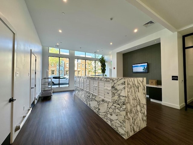 99 Sumner St Unit 305, Boston, MA 02128 - welcome area with recessed lighting