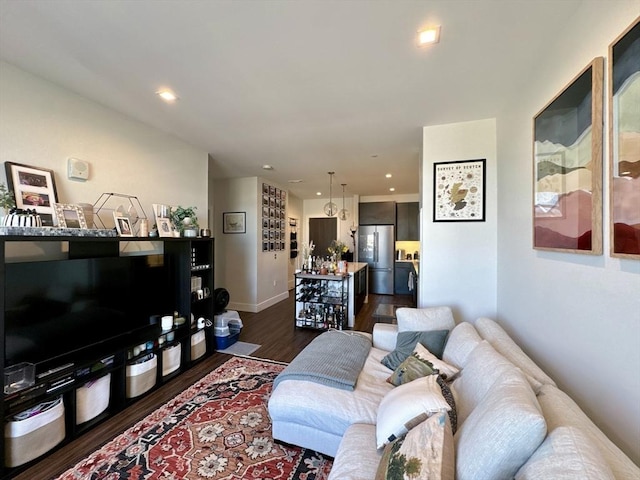 99 Sumner St Unit 305, Boston, MA 02128 - living area featuring dark wood finished floors, baseboards, and recessed lighting