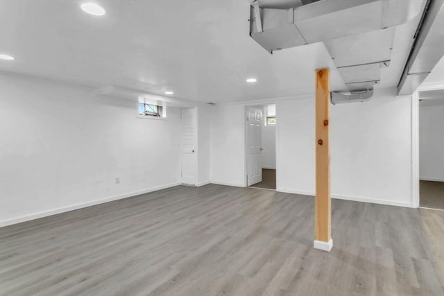 basement featuring light hardwood / wood-style flooring