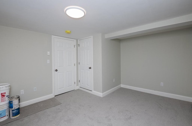 basement with light carpet