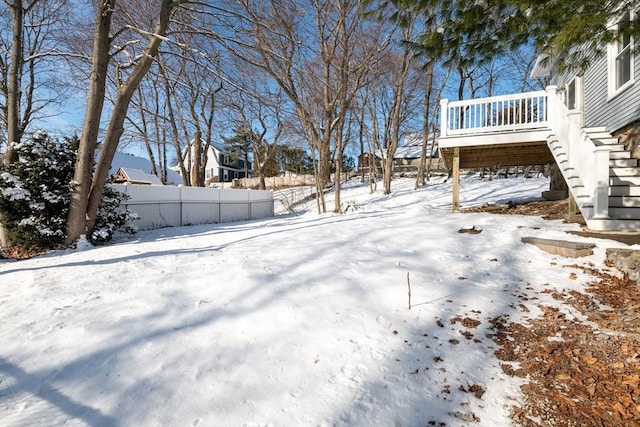 view of yard layered in snow