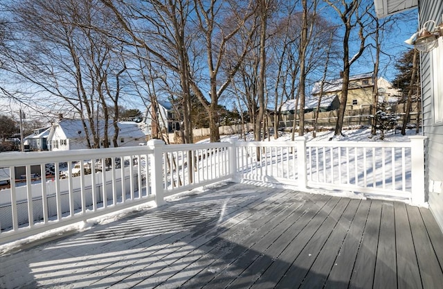 view of snow covered deck