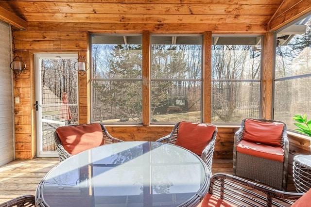 sunroom / solarium with vaulted ceiling and wood ceiling