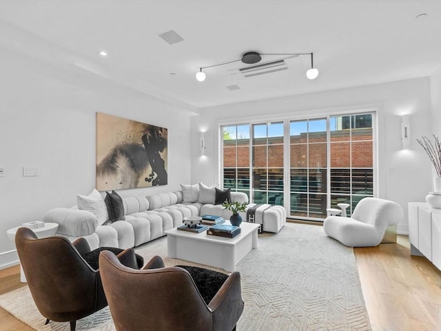 living room featuring light wood-type flooring