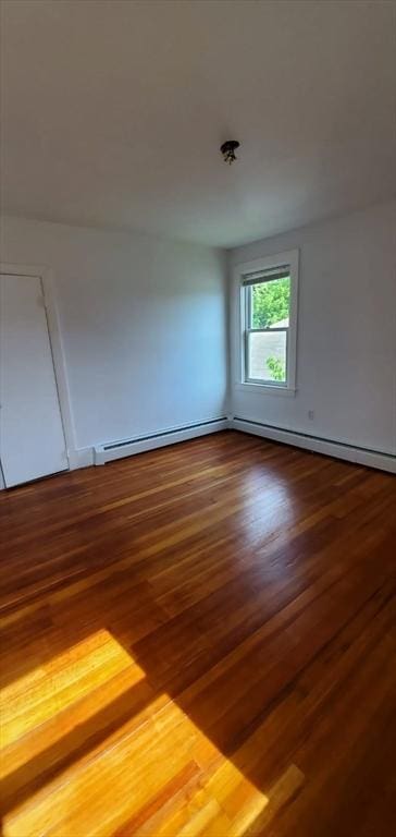 58 Jay St, North Attleboro, MA 02760 - unfurnished room with wood finished floors and a baseboard radiator