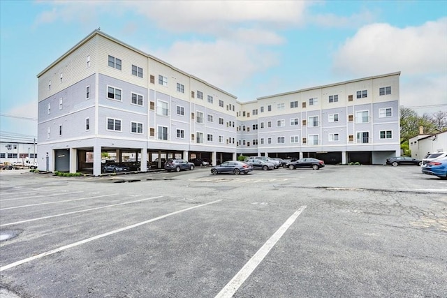 view of property with uncovered parking